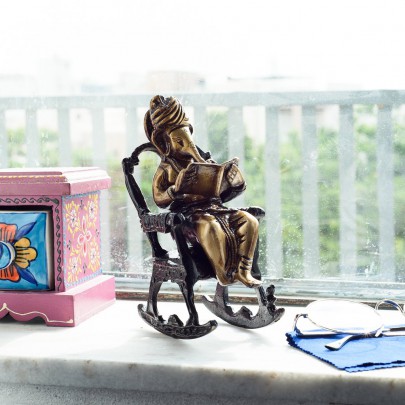 Brass Lord Ganesha on Rocking Chair